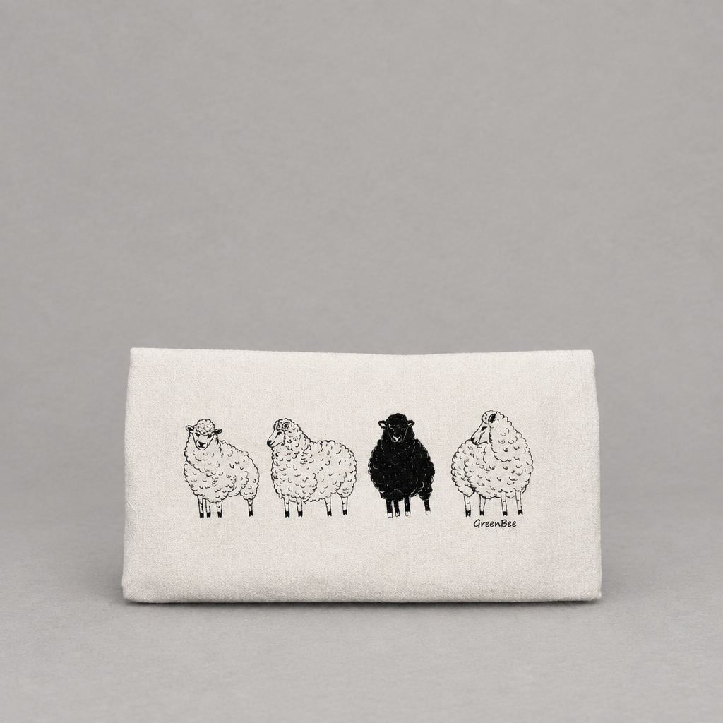 Black Sheep Dish Tea Towel on a light grey background