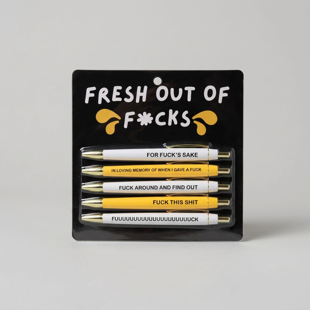 Angled Fresh Out of Fucks pen set on muted light grey background