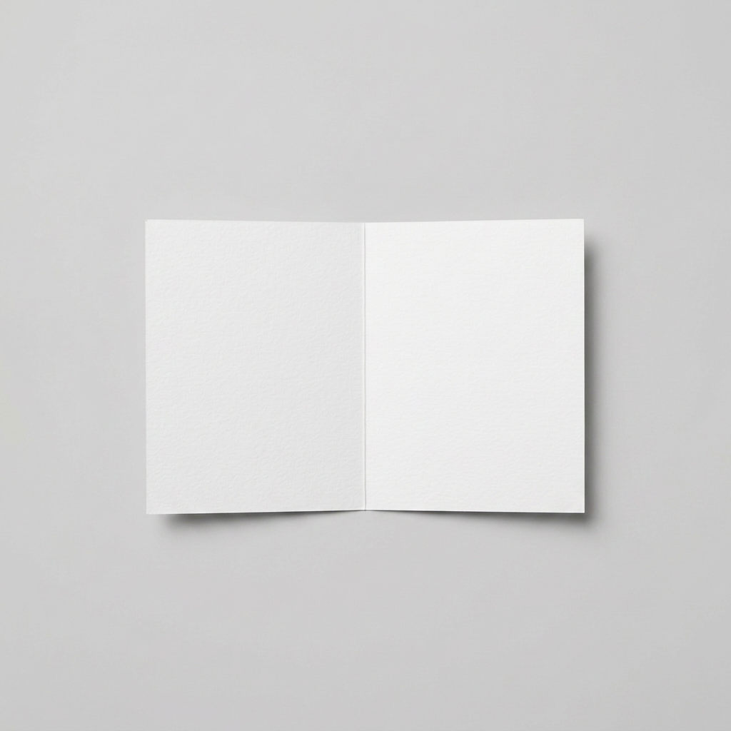 Blank white greeting card interior on a muted light grey background