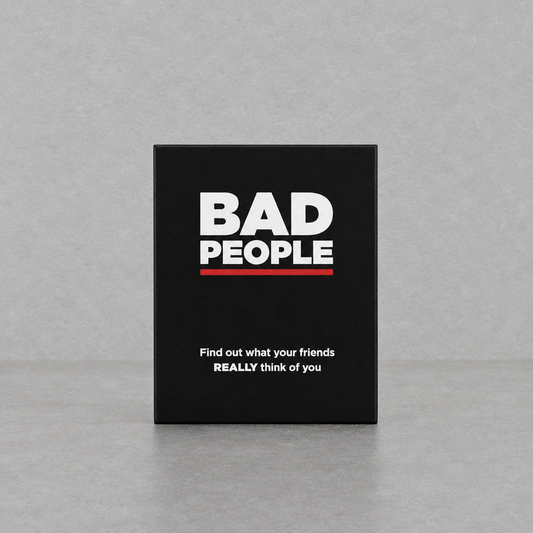 Impish Greetings Bad People party game box with black cover and bold white text on a neutral grey background