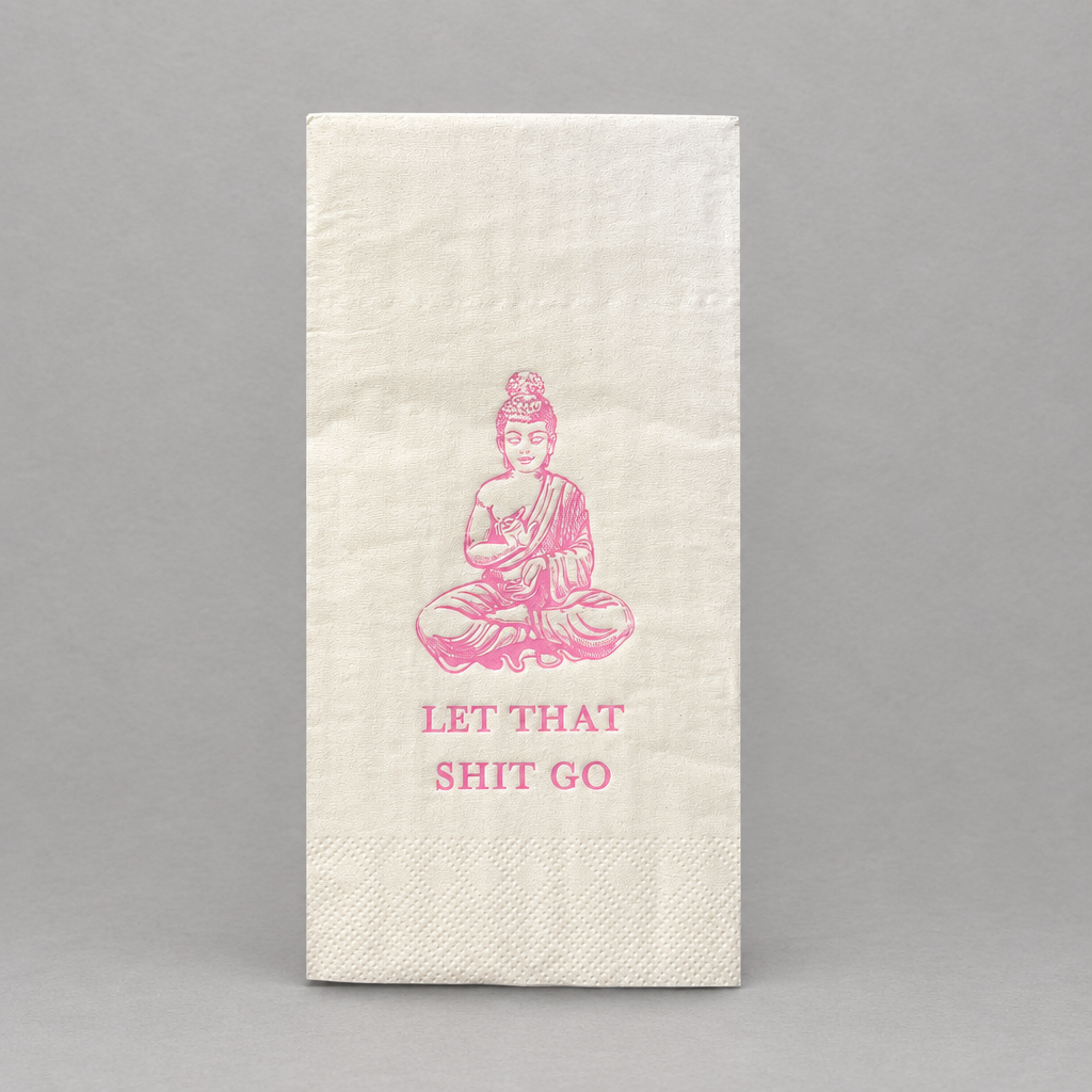 Impish Greetings white paper guest towel with pink foil Buddha illustration and Let That Shit Go text