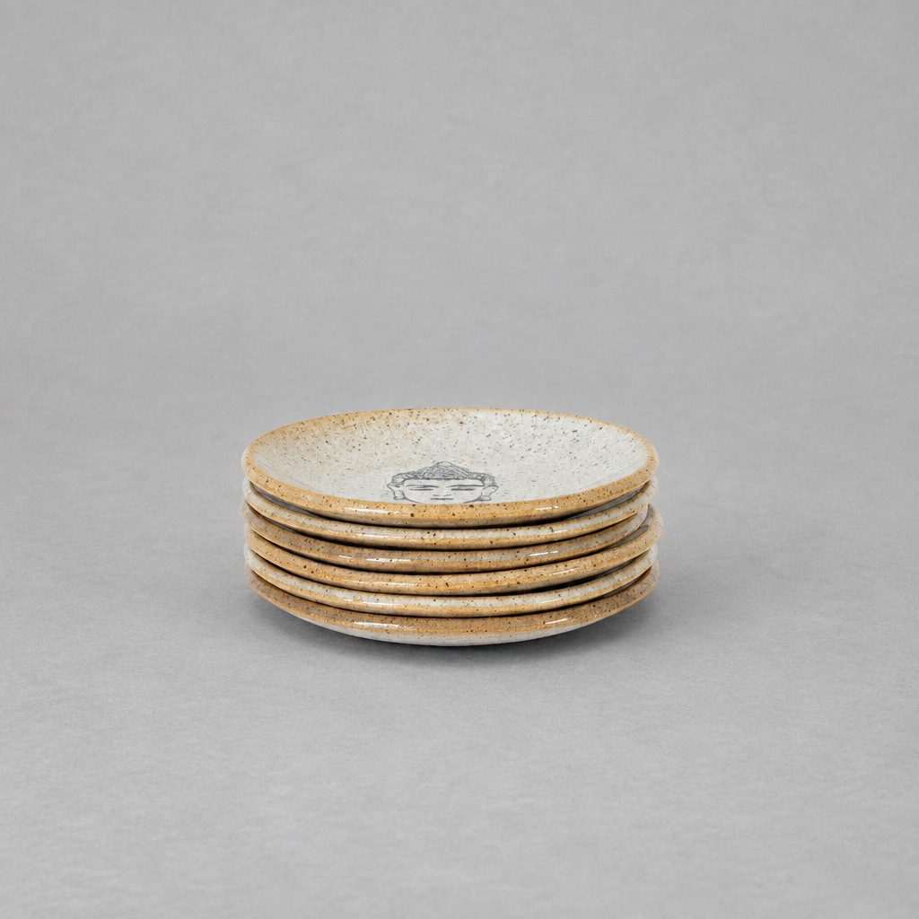 Impish Greetings handcrafted ceramic mini Buddha plates stacked on a neutral background for jewelry or trinkets.