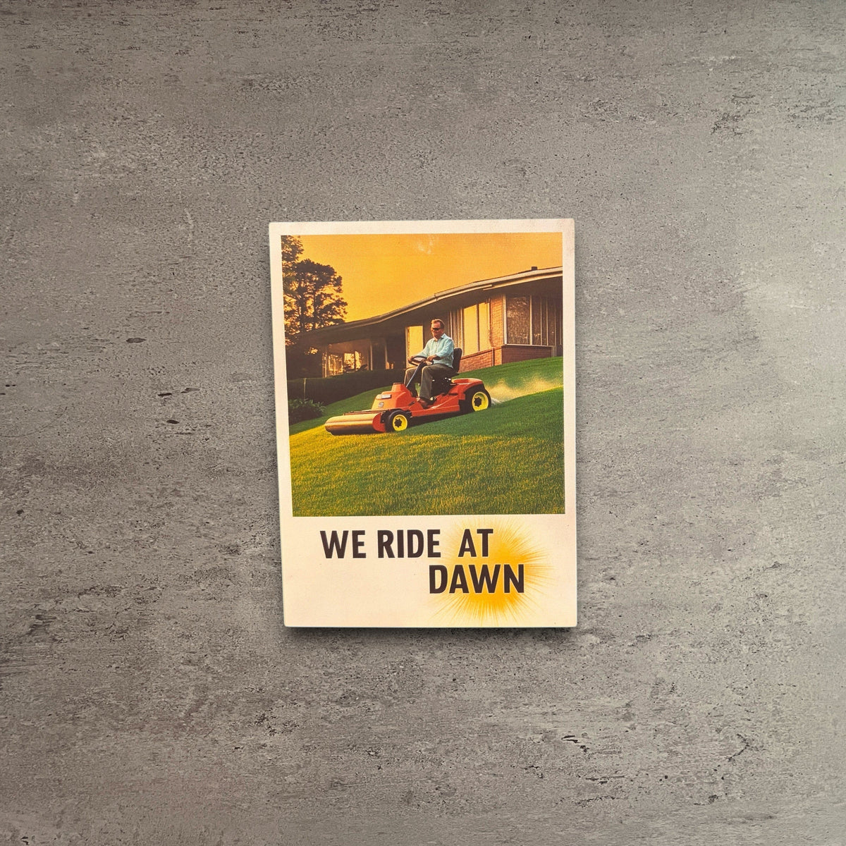 Impish Greetings We Ride At Dawn Father's Day card featuring a vintage illustration of a man mowing a lawn.