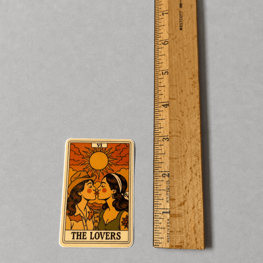 Impish Greetings The Lovers Tarot Cowgirls vinyl sticker with a matte finish next to a wooden ruler for scale.