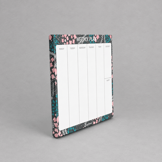Impish Greetings Weekly Plan notepad with floral black border and white weekly columns on eco-friendly paper.