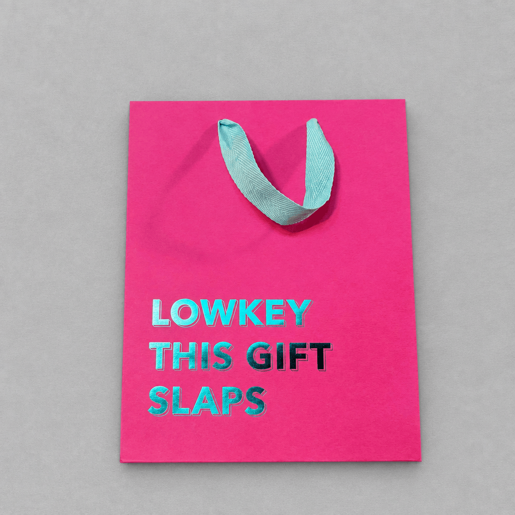 Lowkey Gift Bag Magenta photo 1 on the lighter grey backdrop