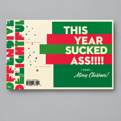 A rectangular greeting card or poster with a bold holiday design, shown against a muted grey background. The card features a cream base with large green and red blocks of color, white text reading 'THIS YEAR SUCKED ASS!!!' and 'i mean.