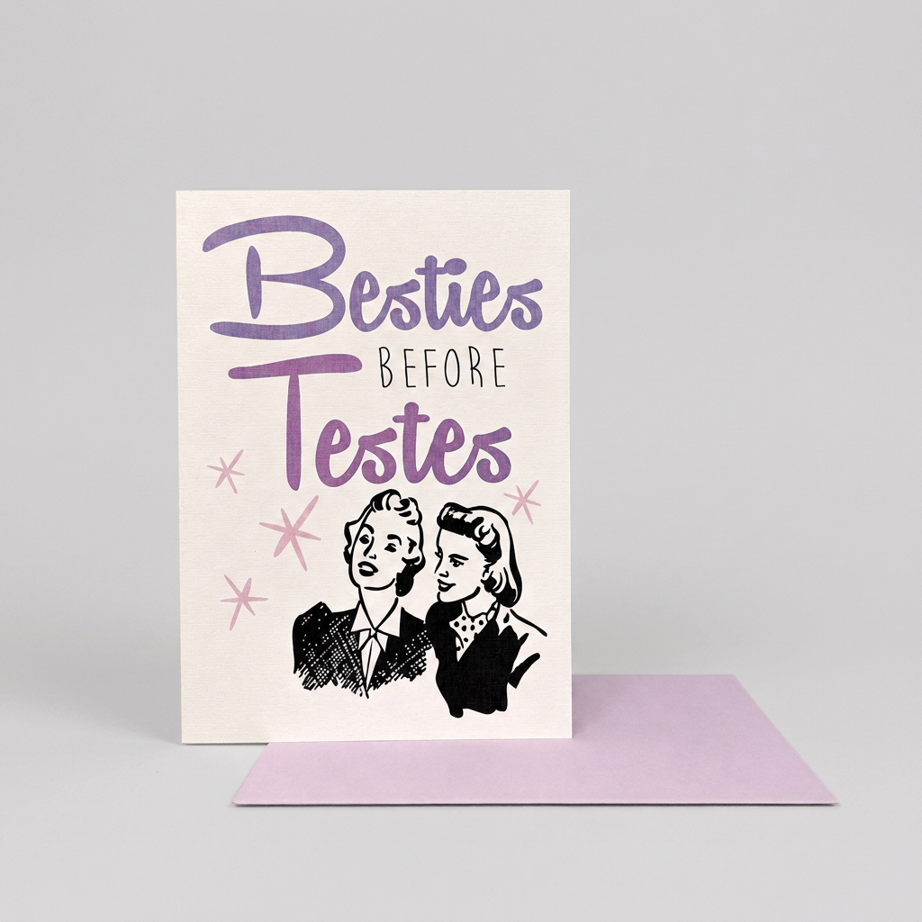 Besties Before Testes card and lavender envelope on a lighter muted-grey background