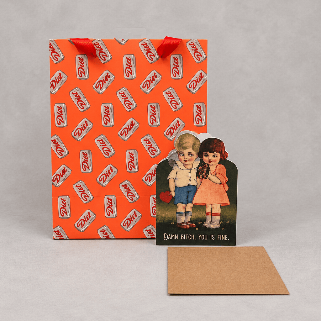Gift bag, card and envelope on muted light-grey background