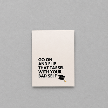 Go on and Flip That Tassel photo 1 on the lighter grey backdrop