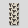 Alternate hanging black cat tea towel view on muted light grey background