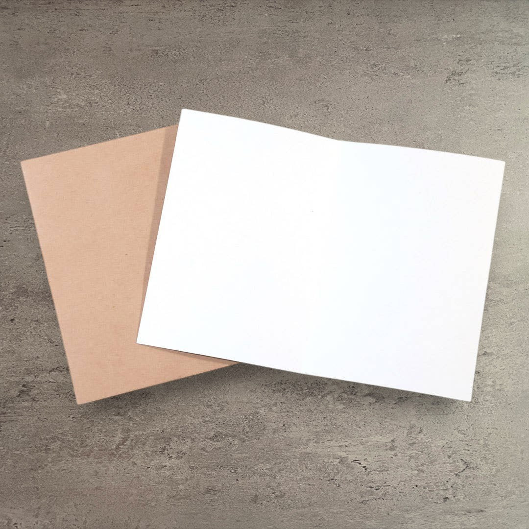 Impish Greetings funny anniversary card with a kraft envelope on a grey textured background