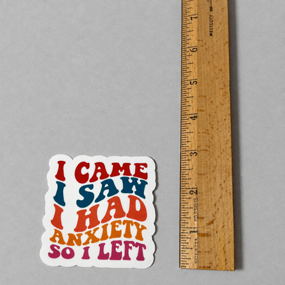 Impish Greetings matte sticker with retro typography reading I Came I Saw I Had Anxiety So I Left next to a ruler