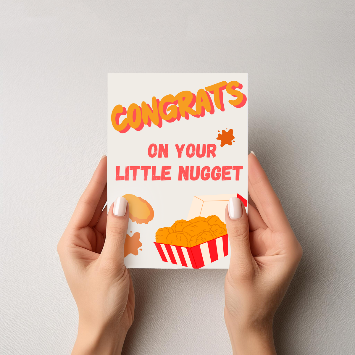 Impish Greetings Congrats on Your Little Nugget baby card with chicken nugget illustration on white cotton paper