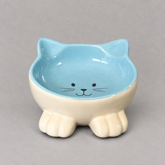 Impish Greetings blue and cream ceramic cat-shaped bowl with a tilted design for improved feline posture.
