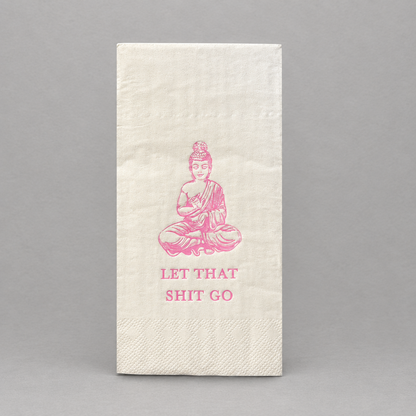 Impish Greetings white paper guest towel with pink foil Buddha illustration and Let That Shit Go text