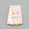 Impish Greetings candy cane print paper guest towels with gold foil text and scalloped edges for holiday decor.