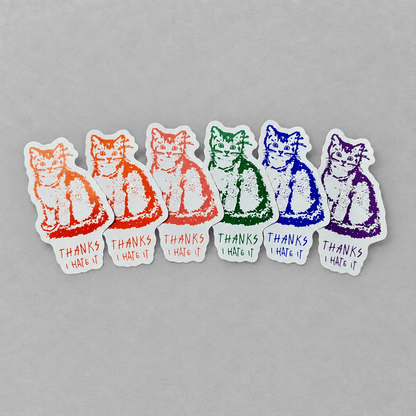 Impish Greetings Thanks, I Hate It vinyl stickers featuring a cat illustration in various vibrant colors.