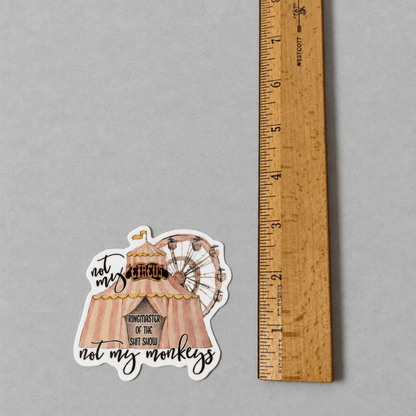 Impish Greetings Not My Circus Not My Monkeys vinyl sticker with a circus tent design and matte finish next to a ruler