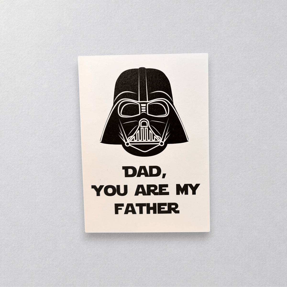 Impish Greetings Dad You're My Father card featuring a black Darth Vader illustration on white recycled cardstock