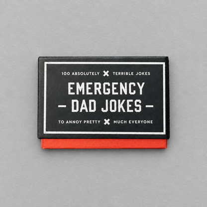 Impish Greetings Emergency Dad Jokes card set in a black and red box with white typography on a grey background
