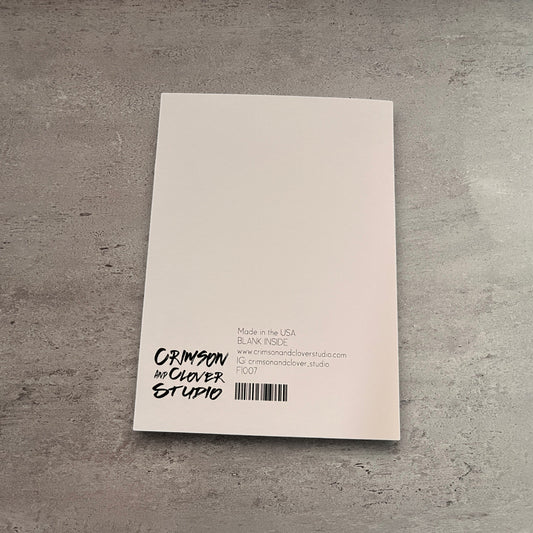 Back of Impish Greetings Father's Day card showing brand logo and product details on textured white cardstock