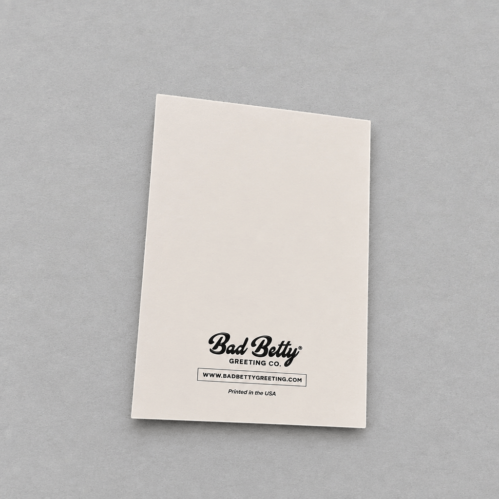 Back of Impish Greetings Father's Day card featuring Bad Betty Greeting Co logo on off-white paper