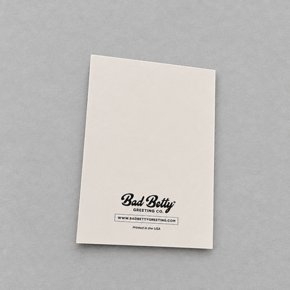Back of Impish Greetings Father's Day card featuring Bad Betty Greeting Co logo on off-white paper