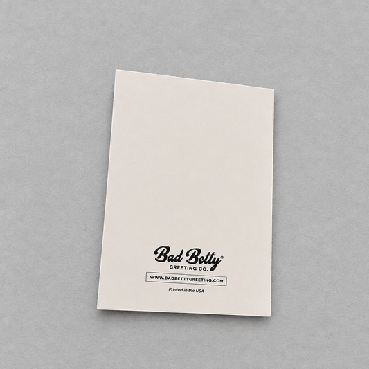 Back of Impish Greetings Father's Day card featuring Bad Betty Greeting Co logo on off-white paper