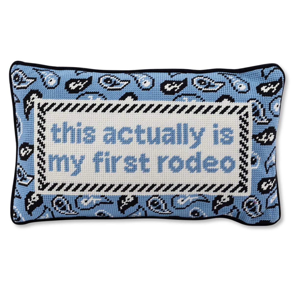 Impish Greetings First Rodeo needlepoint pillow with blue paisley pattern and black and white striped border.