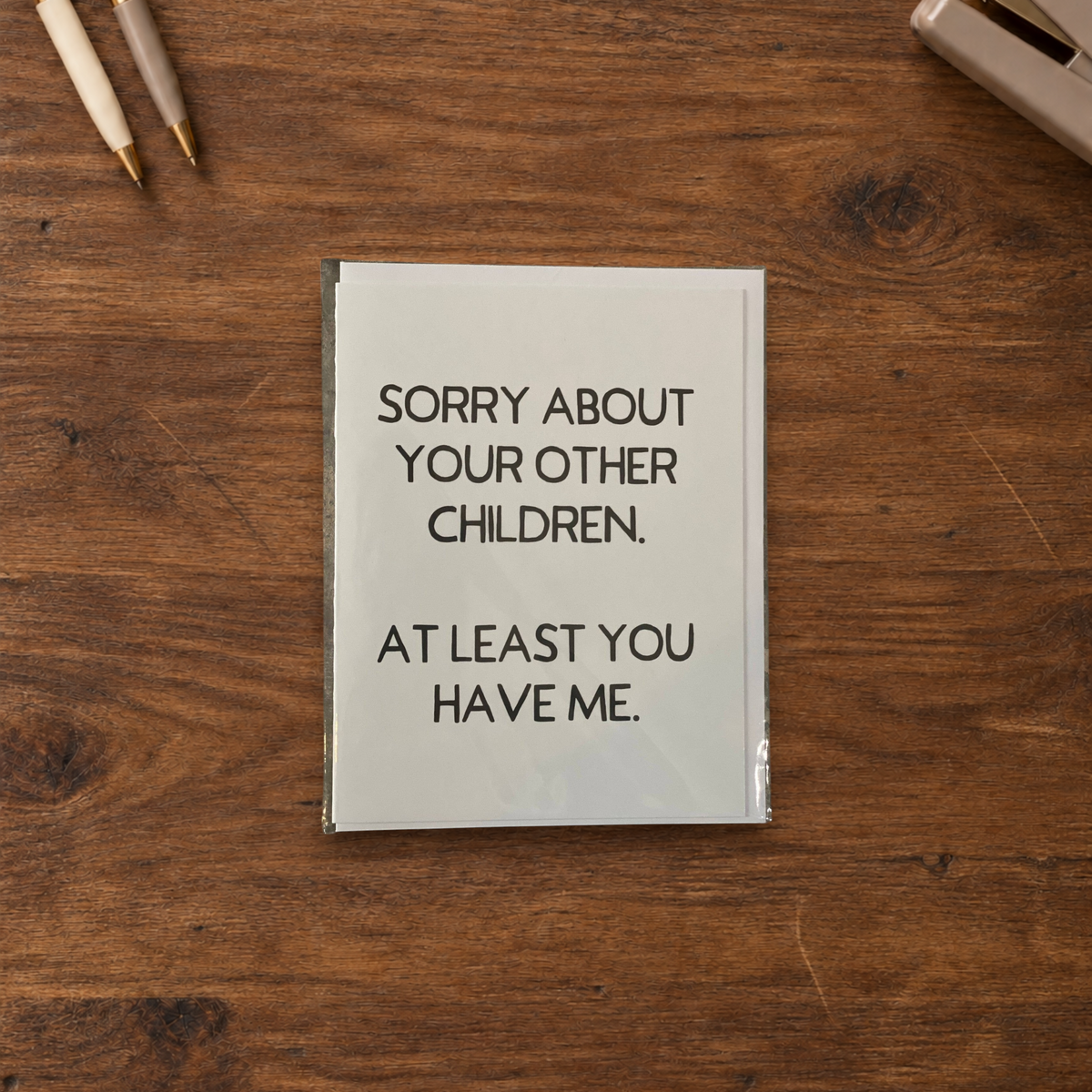 Impish Greetings funny greeting card with black text on white card stock, packaged in a clear cellophane sleeve.