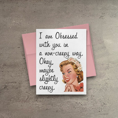 Impish Greetings card with vintage illustration of a woman and text about being obsessed in a funny way with envelope