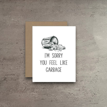 Impish Greetings sympathy card with a dumpster illustration and the text I'm Sorry You Feel Like Garbage