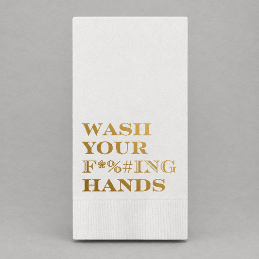 Impish Greetings paper guest towels with Wash Your F*%#ING Hands text in elegant gold foil on white 3-ply paper.