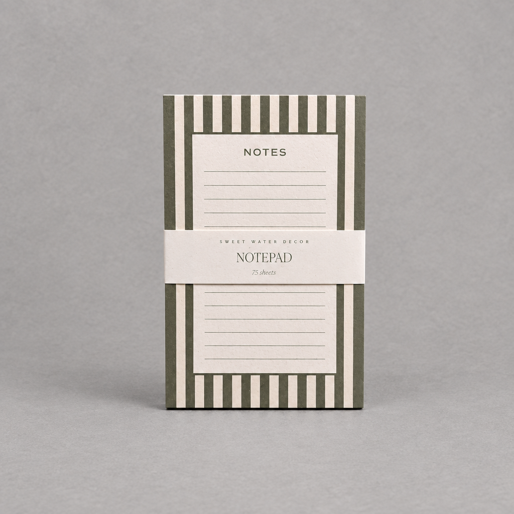 Impish Greetings green and white striped notepad with 75 lined tear-away pages for desk organization.
