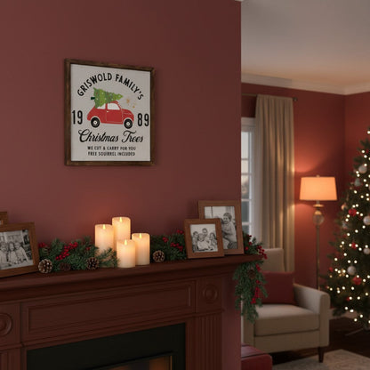 Impish Greetings rustic wood Griswold Family Christmas Trees sign hanging on a red wall above a fireplace mantel.
