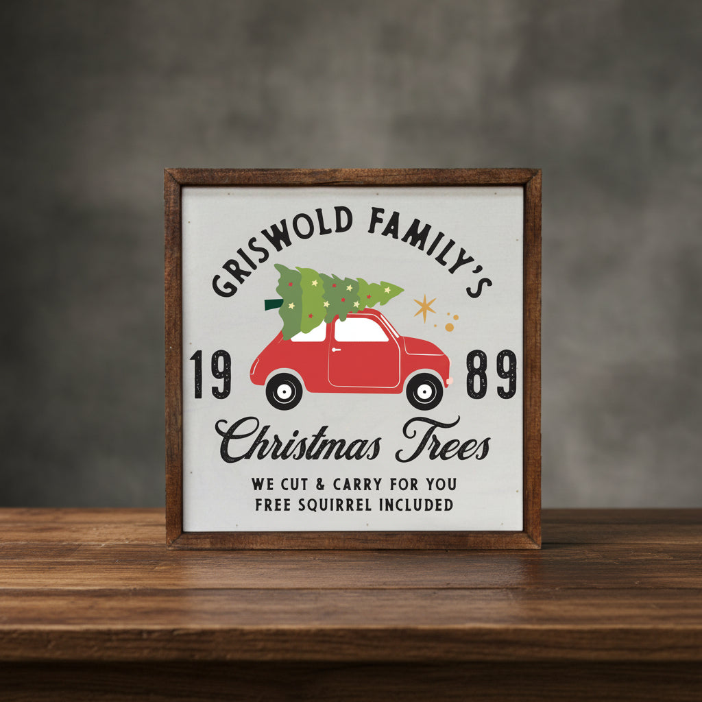 Impish Greetings rustic wood sign featuring a red car with a Christmas tree and Griswold family holiday text