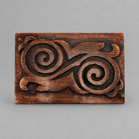 Impish Greetings hand-carved mango wood box featuring a detailed spiral design on the lid for crystal storage.