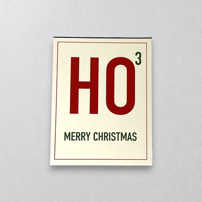 Impish Greetings HO Cubed greeting card with red text and green exponent on cream cardstock with white envelope
