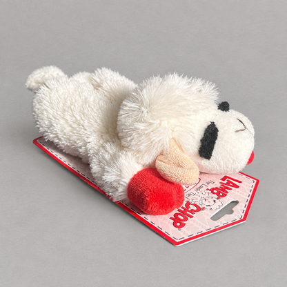 Impish Greetings 6-inch Lamb Chop plush dog toy with soft white fabric, red accents, and a built-in squeaker.