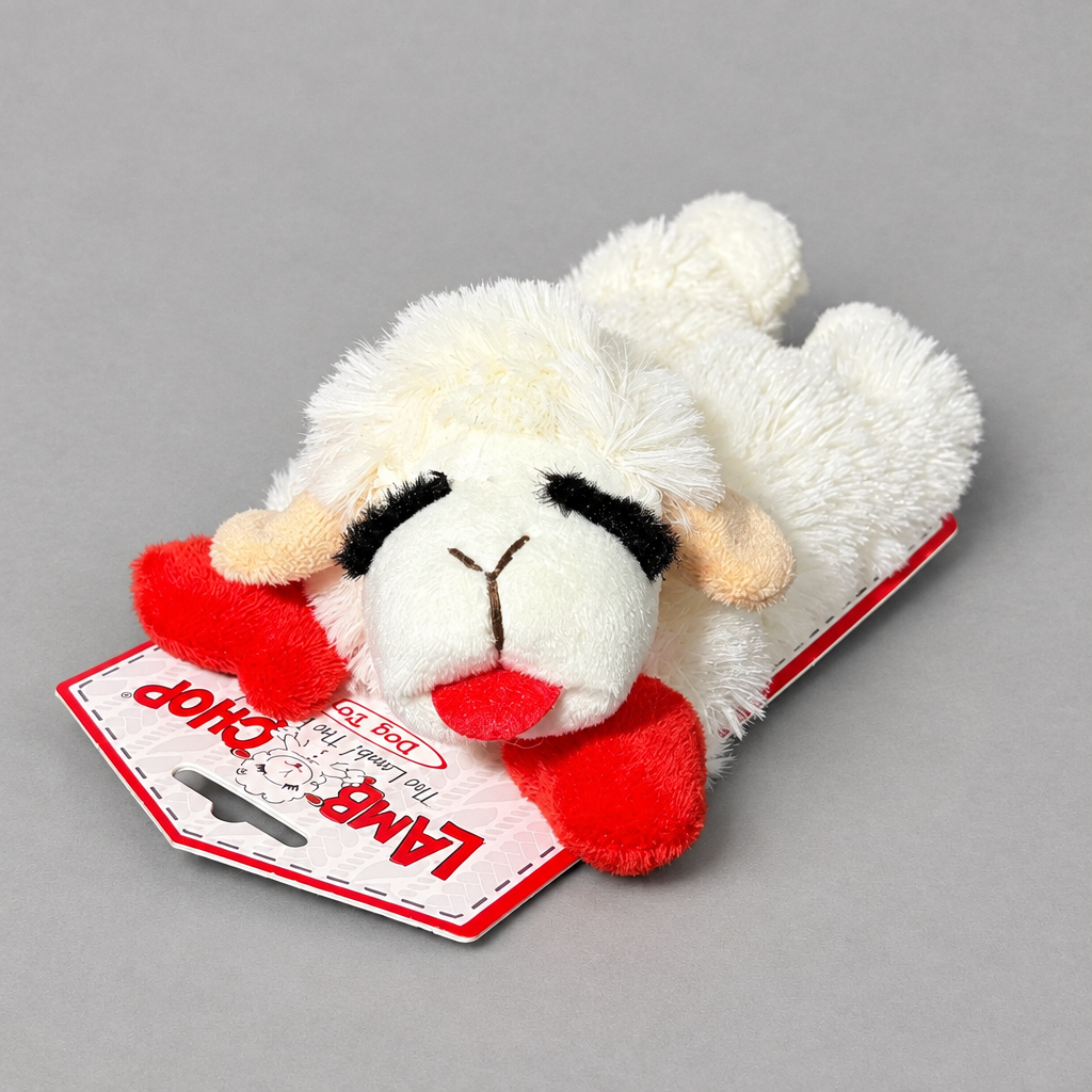 Impish Greetings 6-inch Lamb Chop plush dog toy with soft white fur, red paws, and a built-in squeaker.