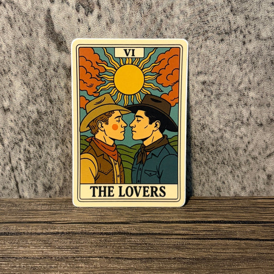 The Lovers tarot sticker featuring two cowboys in a romantic illustration with a matte vinyl finish.