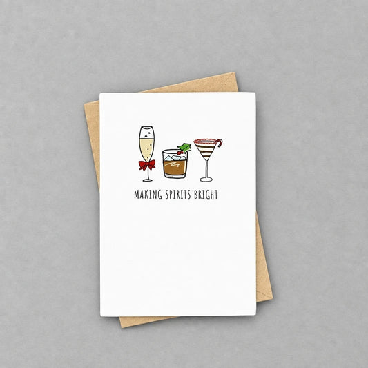 Impish Greetings Making Spirits Bright holiday card with cocktail illustrations on white cardstock and kraft envelope