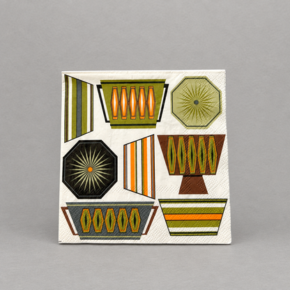 Impish Greetings mid-century modern cocktail napkins featuring retro Pyrex-inspired patterns in blue, green, and orange.
