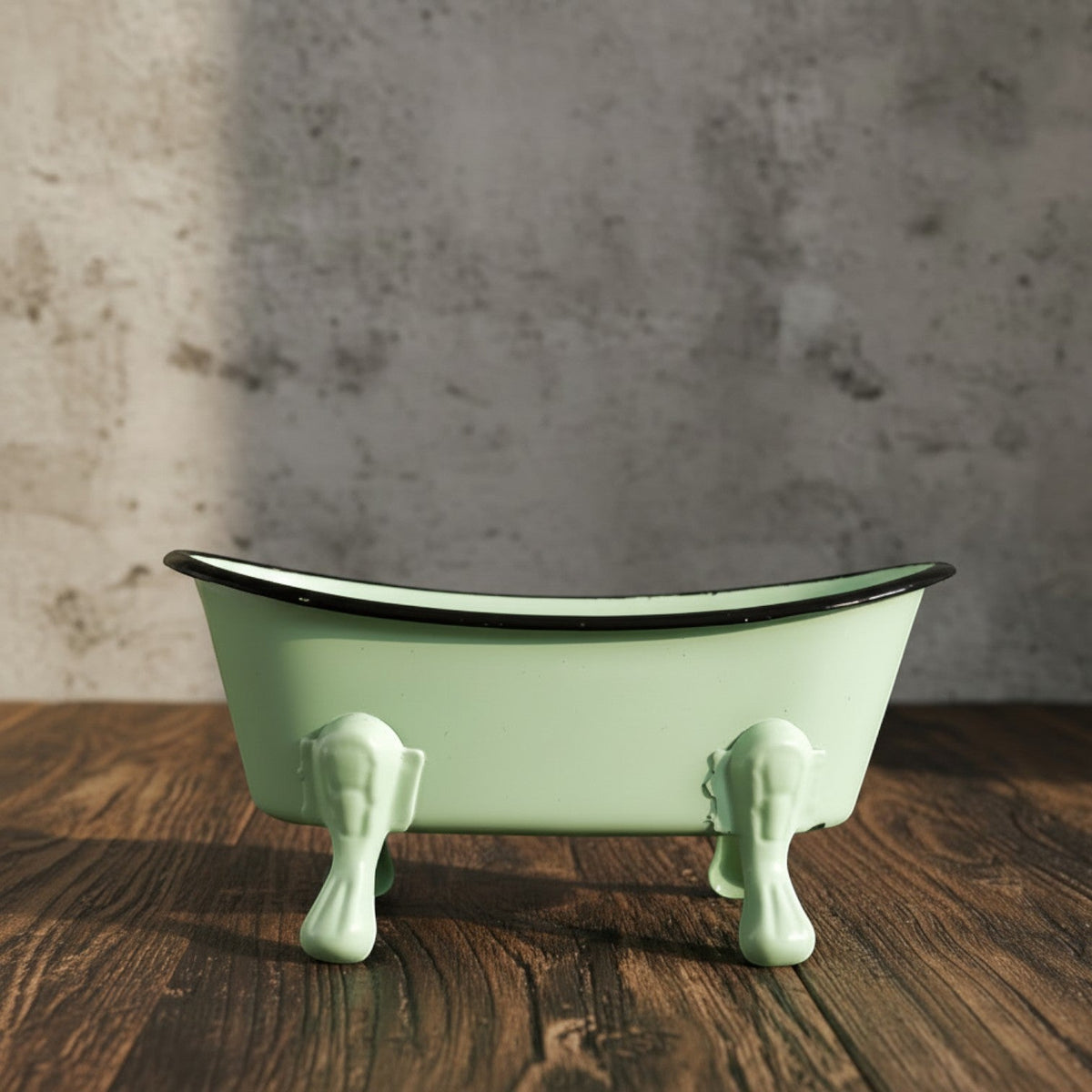 Impish Greetings antique style light green mini clawfoot bathtub soap dish on a wooden surface