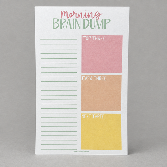 Impish Greetings Morning Brain Dump notepad with lined sections and colorful task boxes on eco-friendly paper.