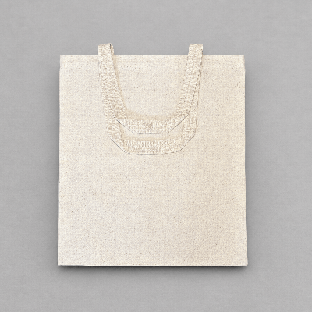 Impish Greetings Ho Bag natural cotton canvas tote bag with sturdy dual handles on a grey background