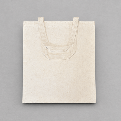 Impish Greetings Ho Bag natural cotton canvas tote bag with sturdy dual handles on a grey background