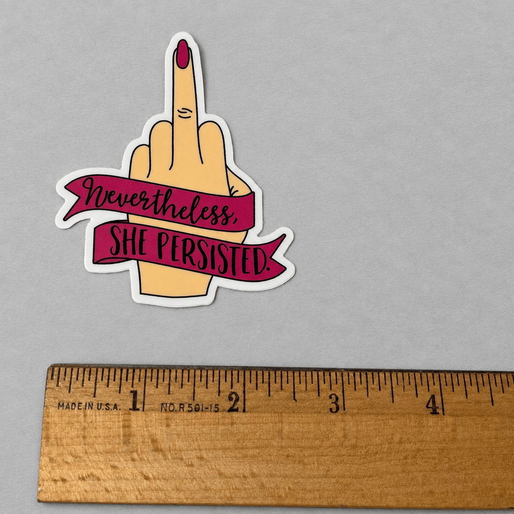Impish Greetings vinyl sticker featuring a hand with a middle finger gesture and a banner reading Nevertheless She Persisted