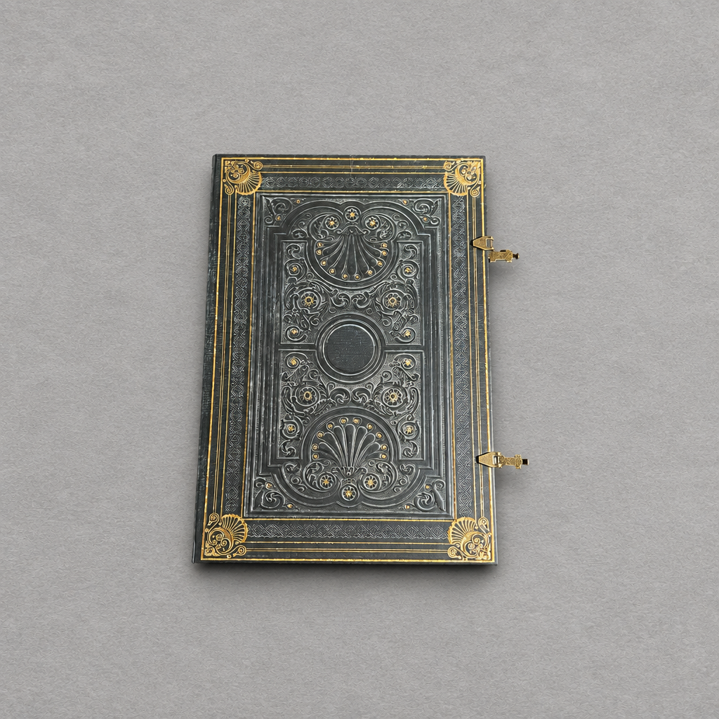 Impish Greetings Paperblanks Nocturnelle Grande journal with ornate black faux leather cover and gold metal clasps.